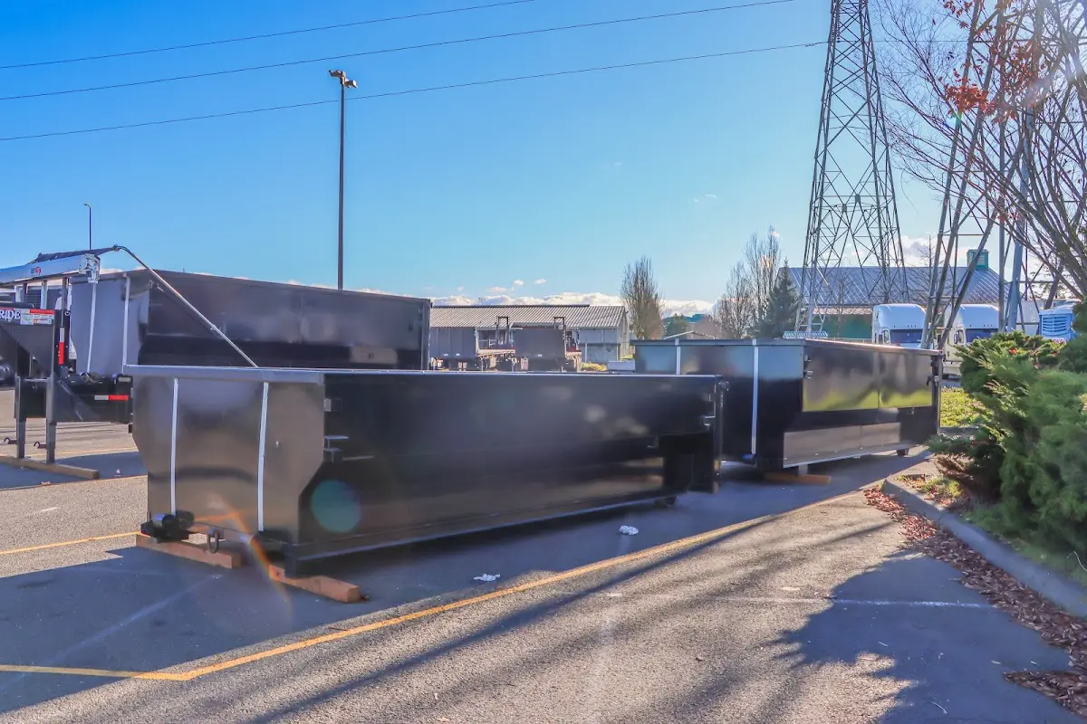 Roll-off dumpster ready for waste disposal at job site for Construction Dumpster Rental in Canby